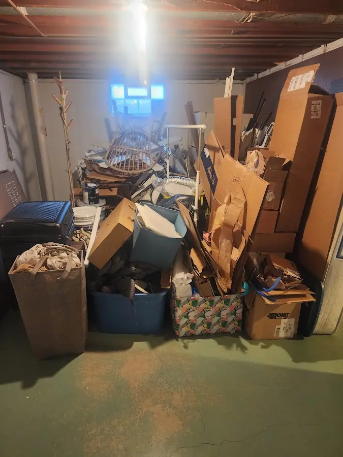 Roll-off dumpster container at job site for 15 Yard Dumpster Rental in Fairfield Plantation